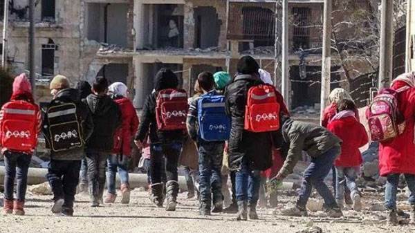 Children Aleppo, Syria - Photo:Children on their way to school in Aleppo, Syria 2017. Credit: Nadim Sherum, SyrianArabRedCrescent