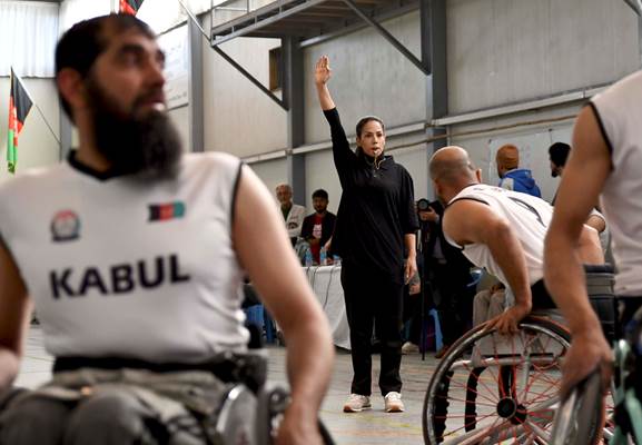 An Afghan female referee, is seen during the Disabled Afghan National Wheelchair Basketball Champion